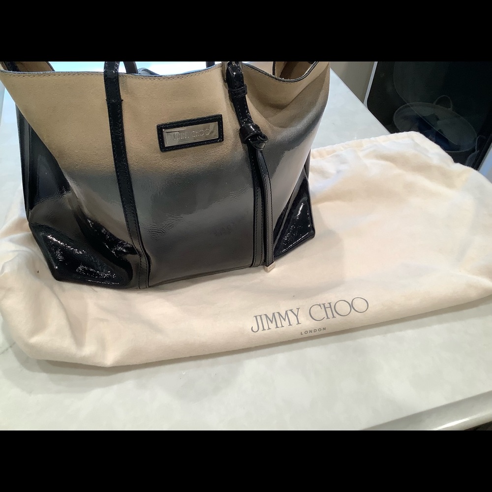 Jimmy Choo tote. Authentication card and Dust bag included. Great condition!